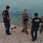 Serinlemek için baraja giren genç boğularak can verdi